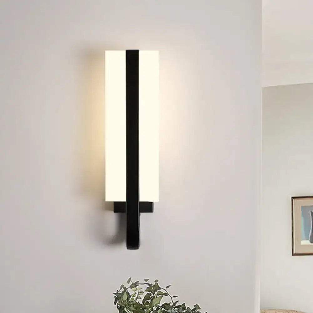 Modern black and white rectangular sconce light fixture with sleek minimalist design and white warm light for living room
