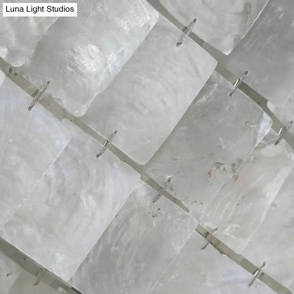 Decorbites modern led shell black island light fixture with translucent white selenite panels and silver metal fasteners