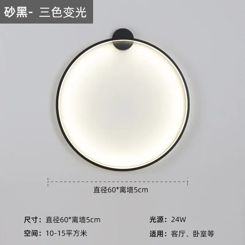 Modern black led wall circle light with sleek black frame sand-black finish and three-color variable lighting for living room