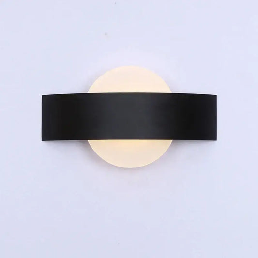 Modern black led wall lamp with a sleek rectangular bar and frosted glass diffuser for bedroom lighting