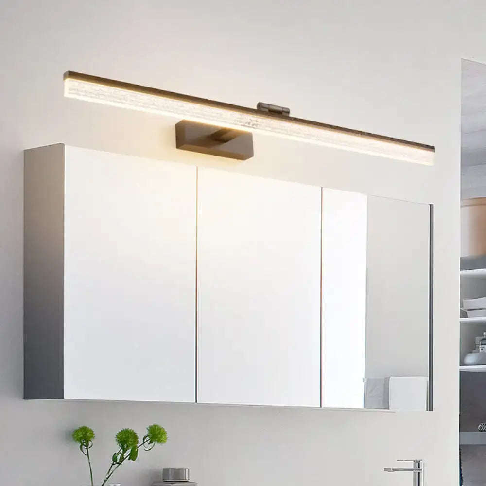 Modern white bathroom cabinet with minimalist design and mirrored door paired with black led wall light with frosted shade