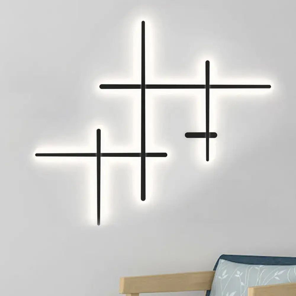 Modern black led wall light with glowing cross-shaped design bulb included and compatible bulb base for living room use