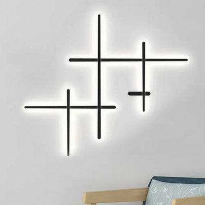 Modern black led wall light with glowing cross-shaped design bulb included and compatible bulb base for living room use