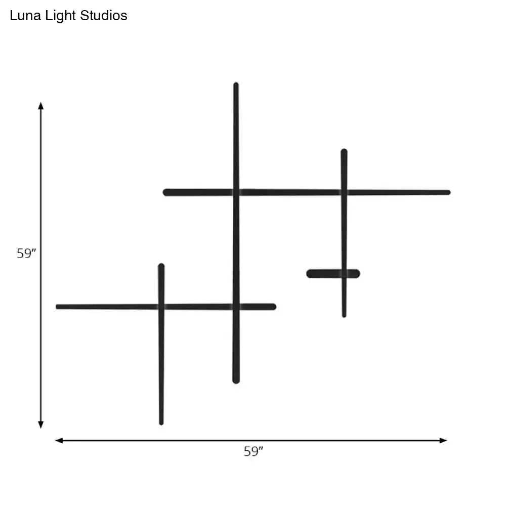 Modern black led wall light featuring three intersecting cross geometric shapes with bulb included and bulb base visible
