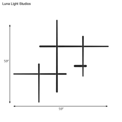 Modern black led wall light featuring three intersecting cross geometric shapes with bulb included and bulb base visible