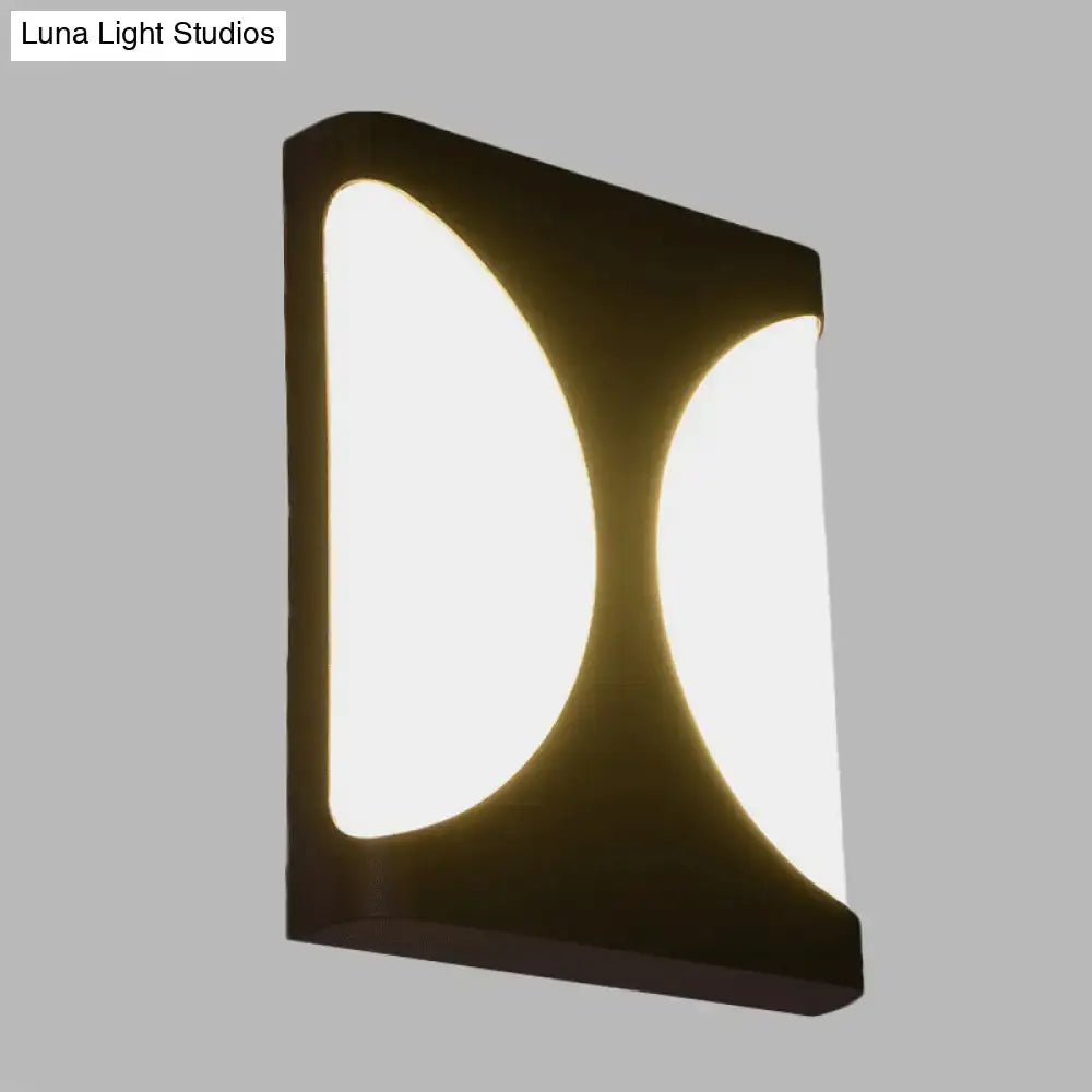 Modern black led wall sconce with double semicircle pattern featuring two illuminated curved light panels for bedroom use