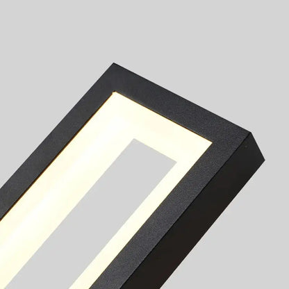 Modern black led wall sconce with sleek design and warm white light emitting from inner frame for bedroom decorbites led wall