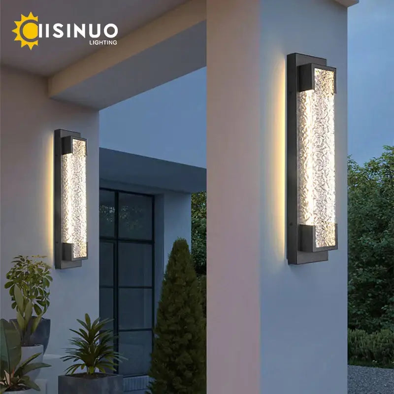 Modern black led wall sconce with textured amber frosted glass panel framed in sleek metal by decorbites dimmable led