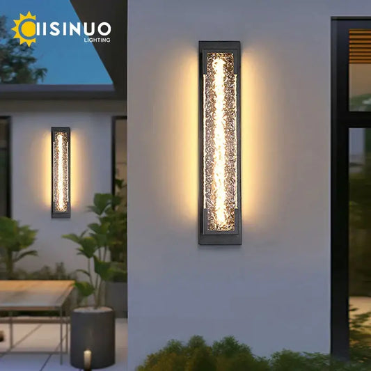 Modern black led wall sconce with textured amber glass panel creating warm light decorbites dimmable led wall sconce