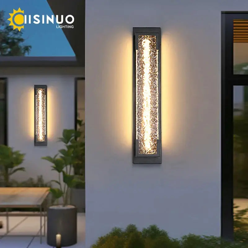 Modern black led wall sconce with textured amber glass panel creating warm light decorbites dimmable led wall sconce