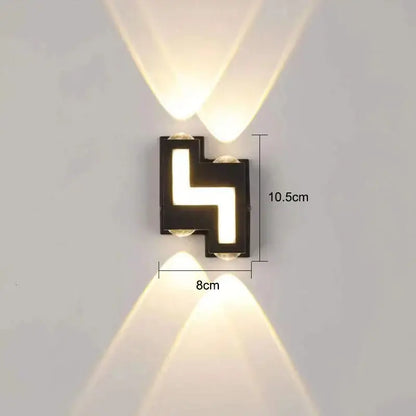 Modern black rectangular ip65 led wall lamp with geometric design and angled warm white beams for garden decorbites ip65 led