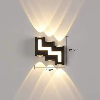 Modern black zigzag-shaped wall lamp with four warm white decorbites ip65 led lights for garden use