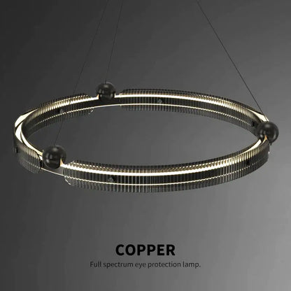 Copper-colored circular pendant lamp with modern ribbed design and embedded led lighting for decorbites light luxury