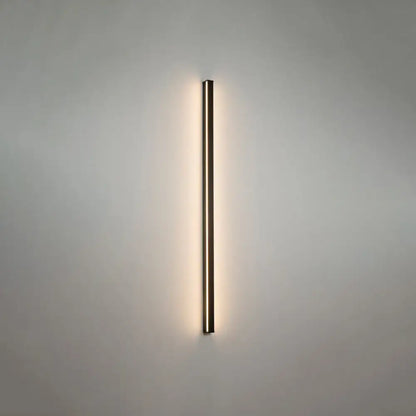 Modern black linear flush mount wall sconce with warm ambient lighting for hallway use in a minimalist rectangular design