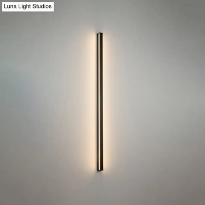Modern black linear flush mount wall sconce with sleek slender design and warm ambient hallway lighting