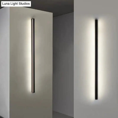 Modern black linear flush mount wall sconce with minimalist design and warm ambient hallway lighting