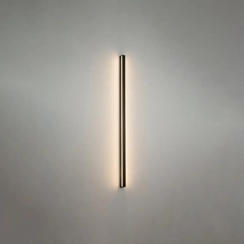 Minimalist black linear flush mount wall sconce with warm ambient lighting for modern hallway use