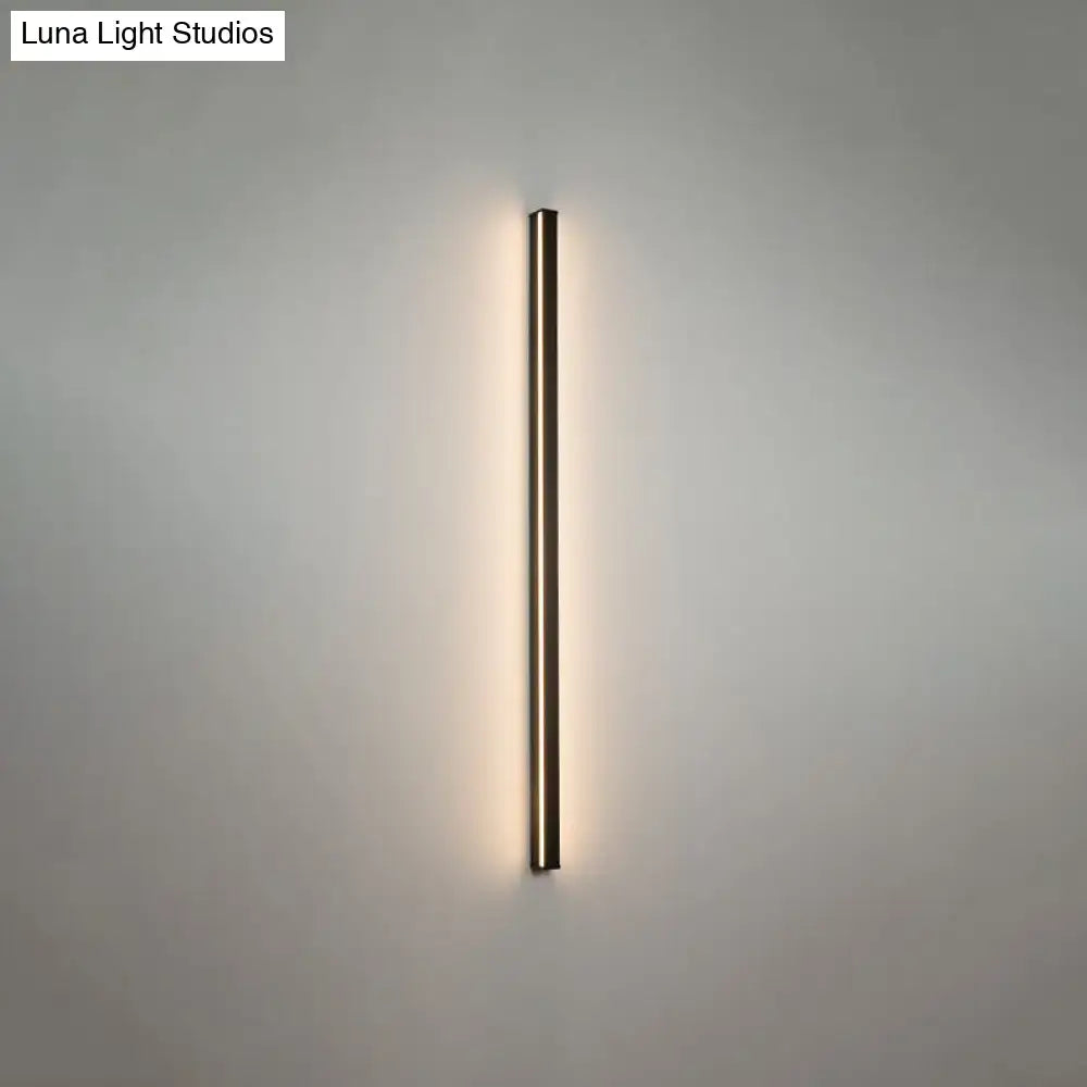 Modern black linear flush mount wall sconce with slim rectangular design and warm ambient glow for hallway lighting