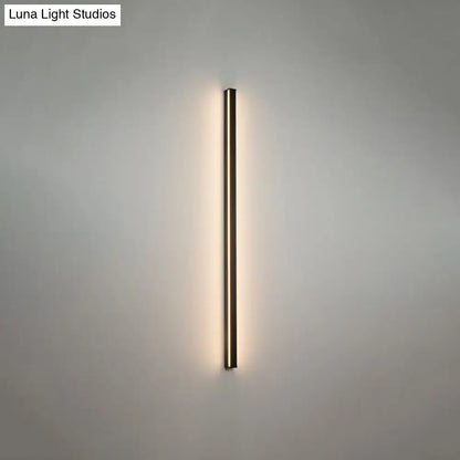 Modern black linear flush mount wall sconce with slim rectangular design and warm ambient glow for hallway lighting