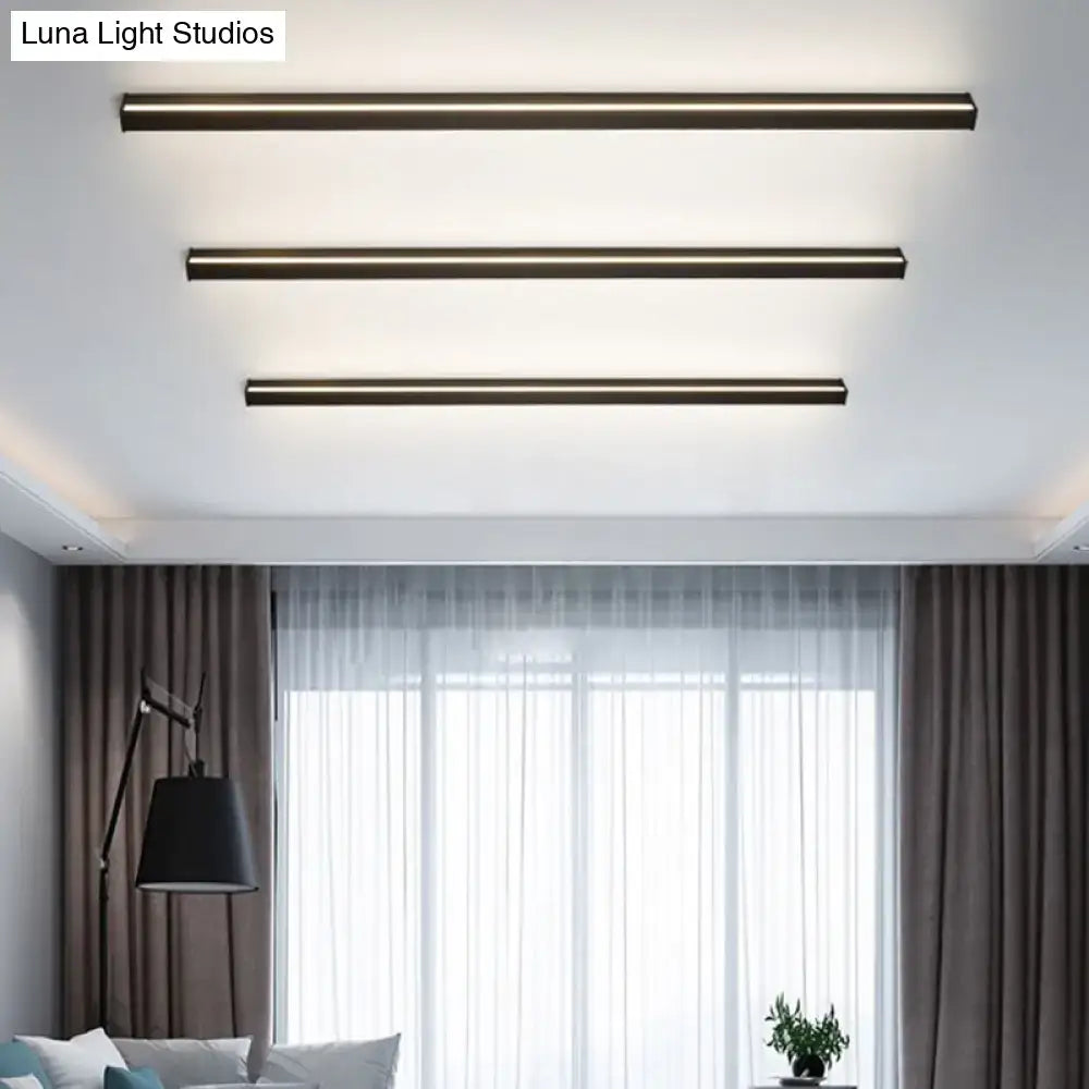 Three sleek modern black linear flush mount ceiling lights with brushed bronze finish for hallway lighting