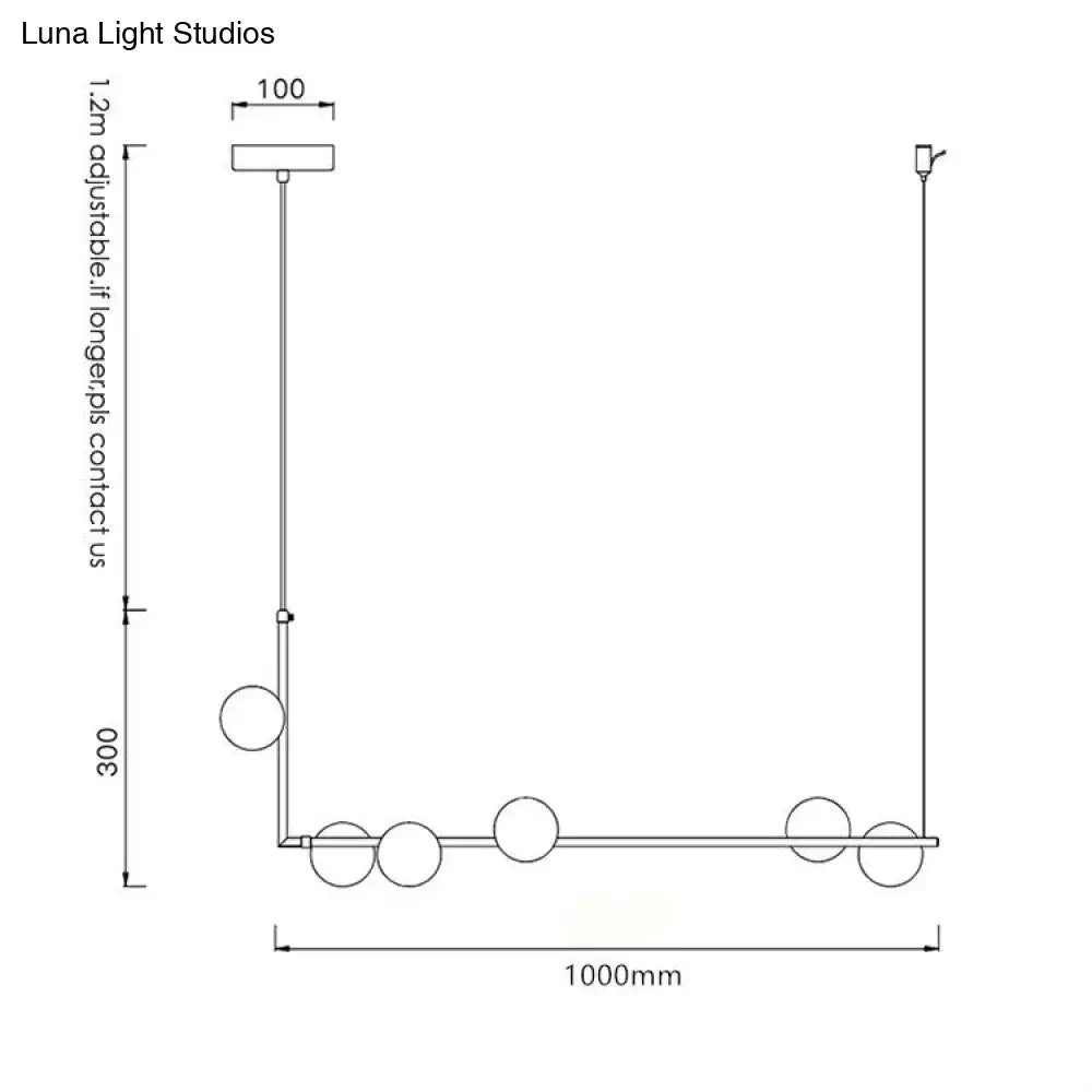 Modern black linear island pendant light with glass shade featuring a sleek metallic frame and spherical glass shades
