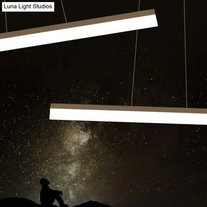 Two sleek acrylic rectangular led light fixtures of decorbites™ suspension lamp hang against starry sky with remote control