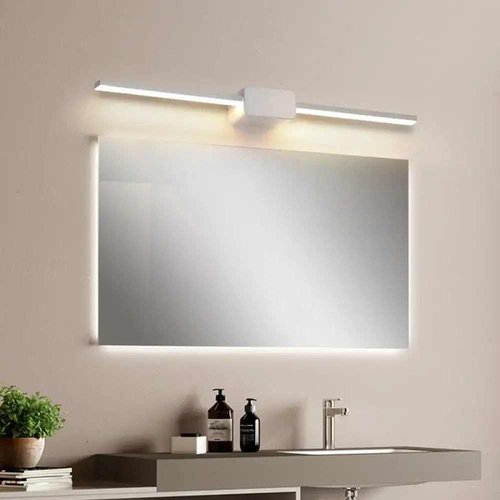 Modern black linear led sconce with sleek white framed rectangular bathroom vanity mirror featuring integrated led lighting