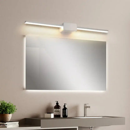 Modern black linear led sconce with sleek white framed rectangular bathroom vanity mirror featuring integrated led lighting