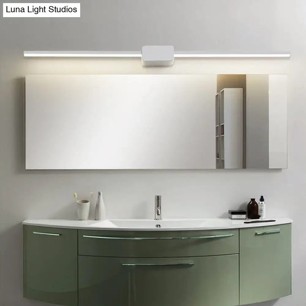 Modern rectangular bathroom mirror with sleek white frame and integrated led lighting above for bathroom vanity use