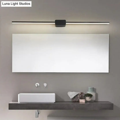 Modern black linear led sconce with sleek minimalist design mounted above mirror for bathroom vanity lighting