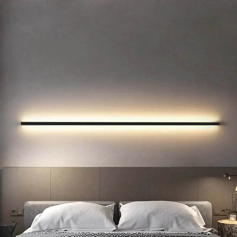 Modern black linear led wall sconce emitting warm glow compatible with decorbites led wall lights dimming for bedrooms