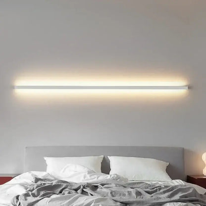 A sleek modern white decorbites led wall sconce with slim rectangular design and warm light for wall lights dimming
