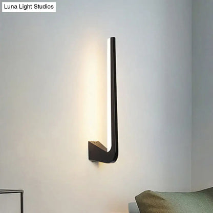 Modern black linear led wall sconce with sleek minimalist design and warm light for living room direct wired electric use