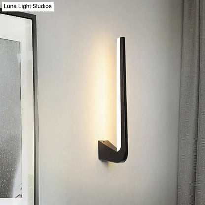 Modern black linear led wall sconce with sleek minimalist design and warm light for living room direct wired electric use