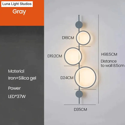Modern black linear long led wall light with gray minimalist iron frame and three circular led lights for living room use
