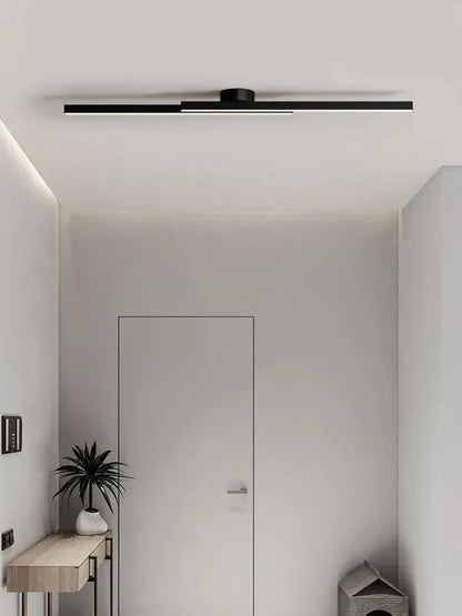 Modern black linear nordic ceiling lamp with sleek design suitable as a ceiling lamp for living room lighting