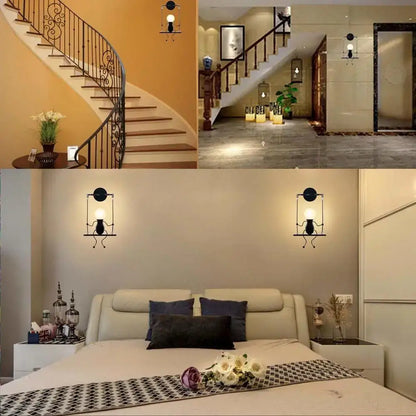 Modern black little man led wall light featuring minimalist wrought iron design with circular tops and hanging bulbs