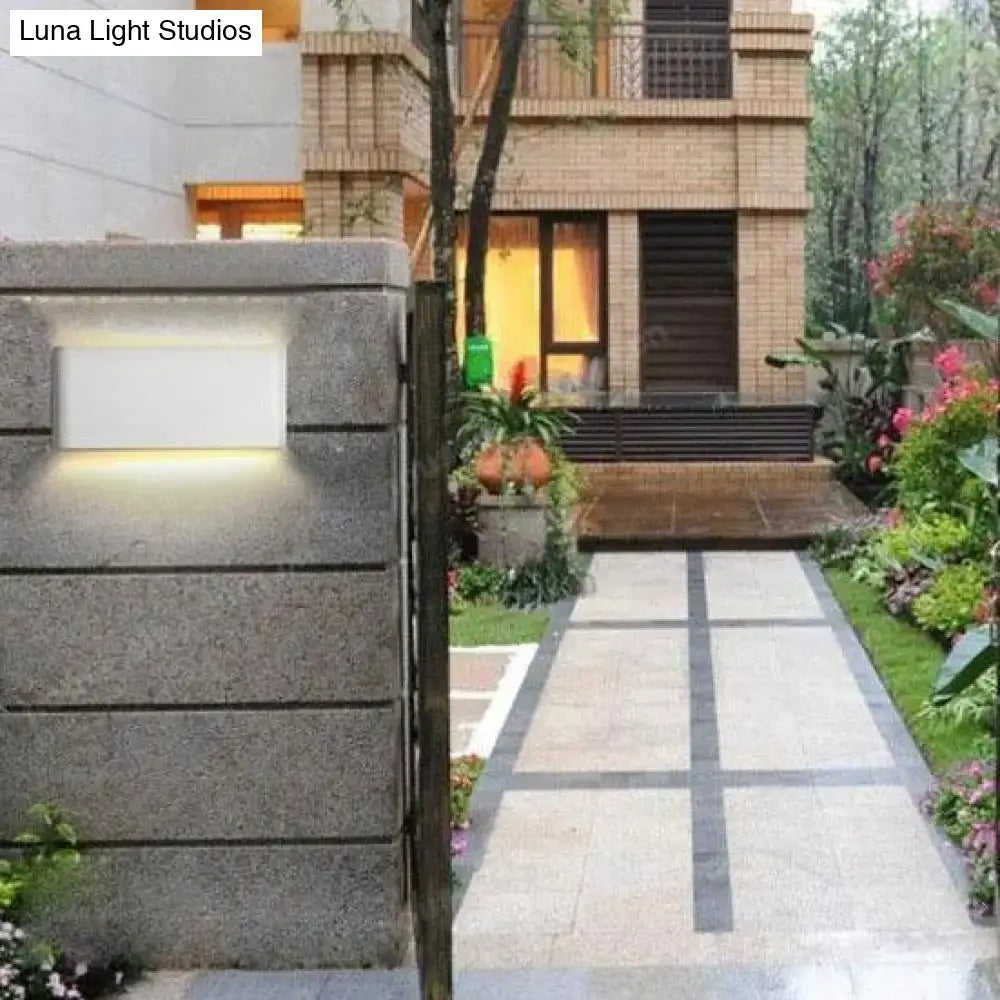 Modern black luna outdoor wall light with sleek rectangular design and warm ambient led glow for patio lighting