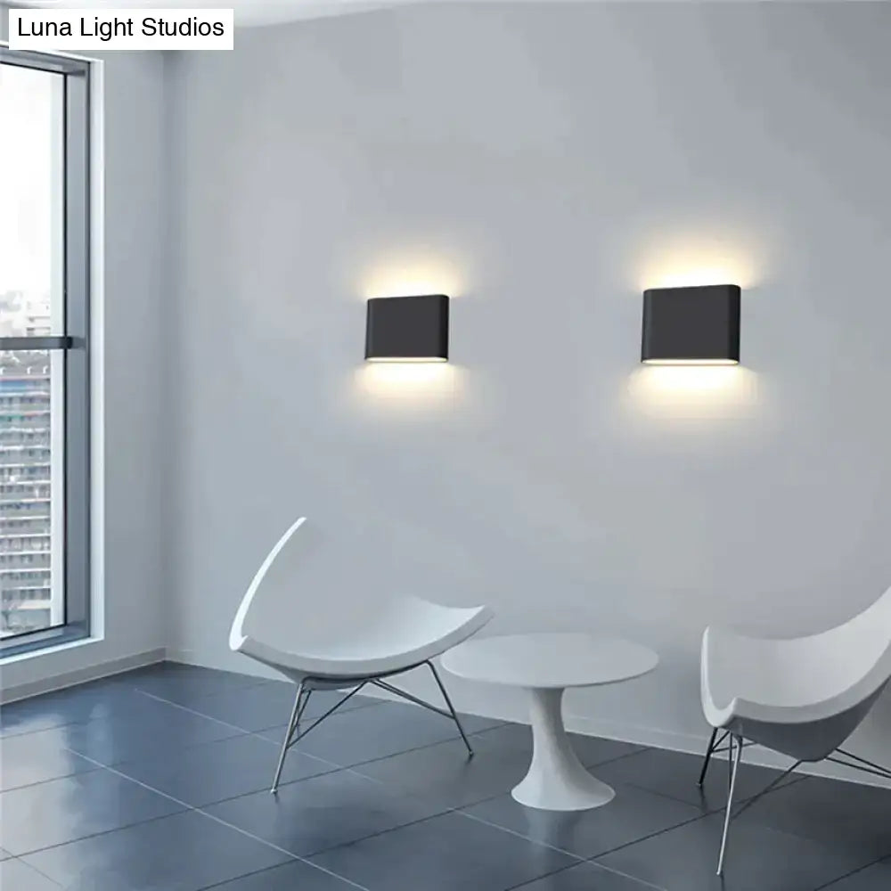 Modern black luna outdoor wall light featuring sleek minimalist rectangular sconces with warm LED for patios