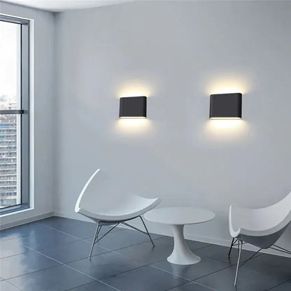 Modern black luna outdoor wall light featuring sleek rectangular design with warm led for patio illumination