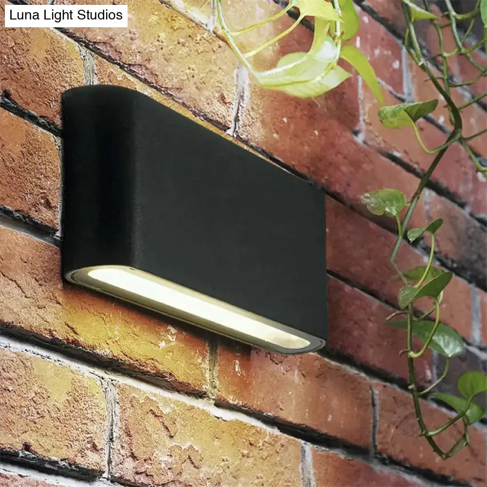 Modern black luna outdoor wall light with sleek rectangular led design for warm patio illumination