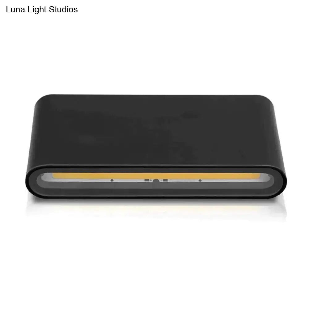 Modern black luna outdoor wall light featuring a sleek rectangular led wall sconce with integrated warm yellow light strip