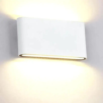 Modern black luna outdoor wall led light with a sleek white rectangular design and warm glow for patio use