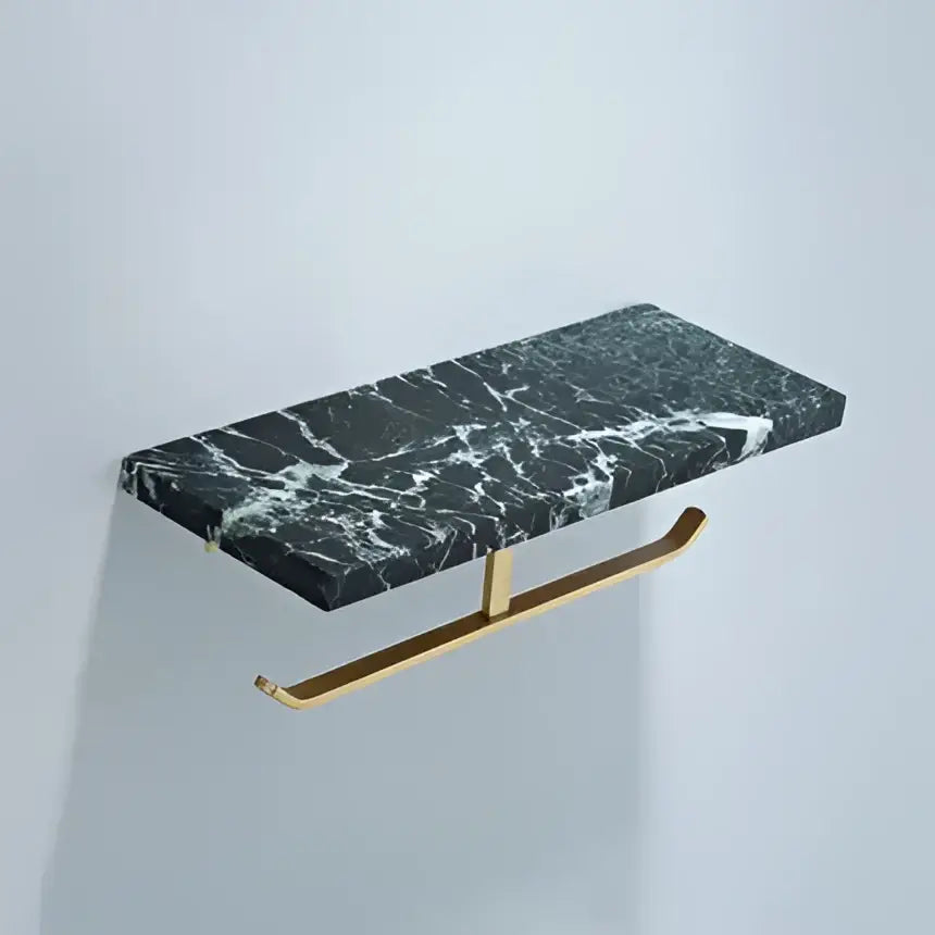 Modern black marble and gold double toilet paper holder with sleek gold-tone metal bracket for bathroom use