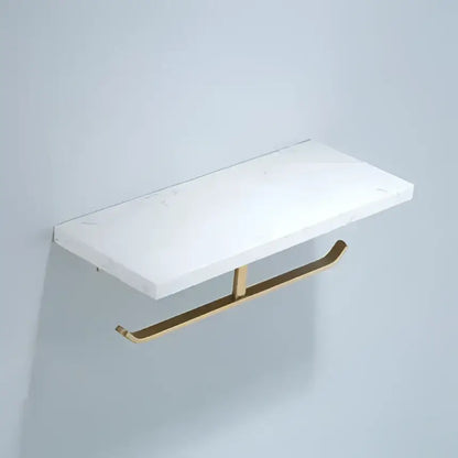 Modern white marble toilet paper holder with sleek gold-tone metal base for bathroom use and paper holder functionality