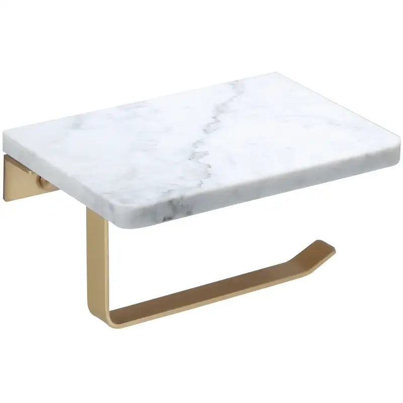 White marble toilet paper holder with gold-tone metal base and mounting bracket for modern bathroom use