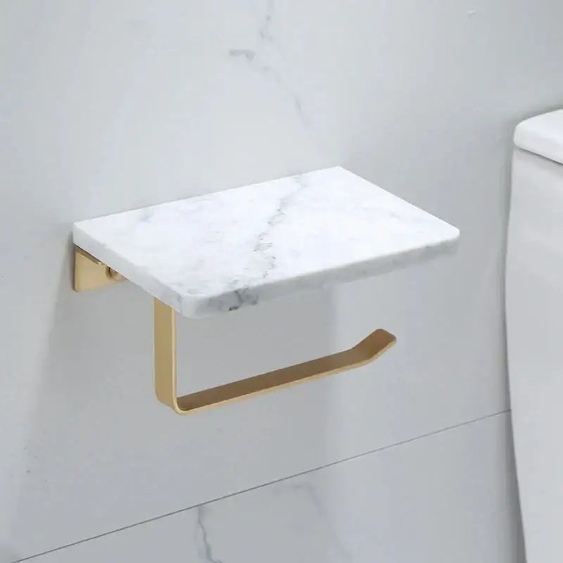 Modern black marble and gold double toilet paper holder featuring a white marble paper holder with gold-tone metal base and curved arm