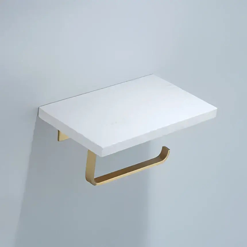 Modern black marble and gold toilet paper holder with white rectangular wall-mounted paper holder and metal base