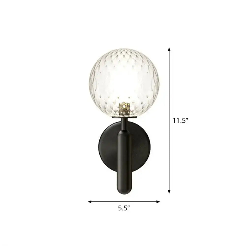 Modern black matte glass globe wall sconce with clear faceted glass for stairs lighting featuring black gold accents