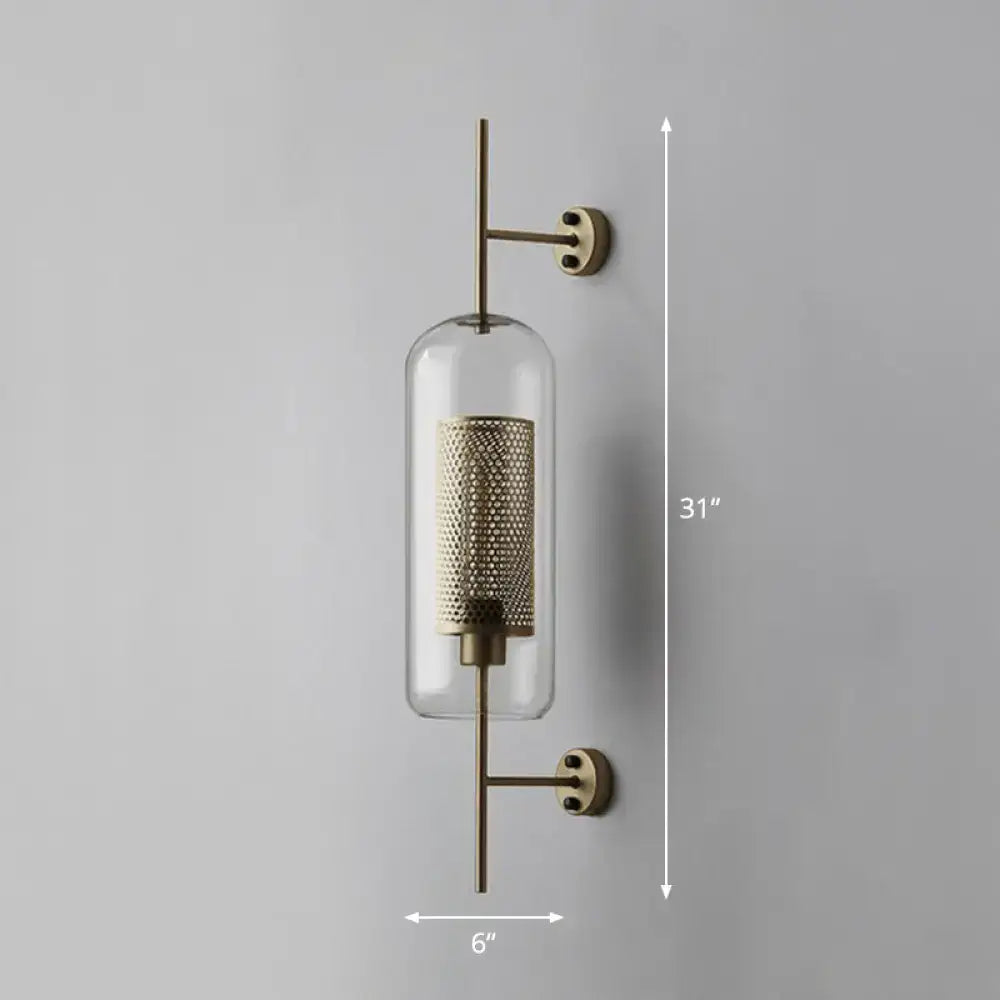 A sleek 31-inch tall modern black mesh wall mount lamp with a clear glass cylinder for bedroom lighting